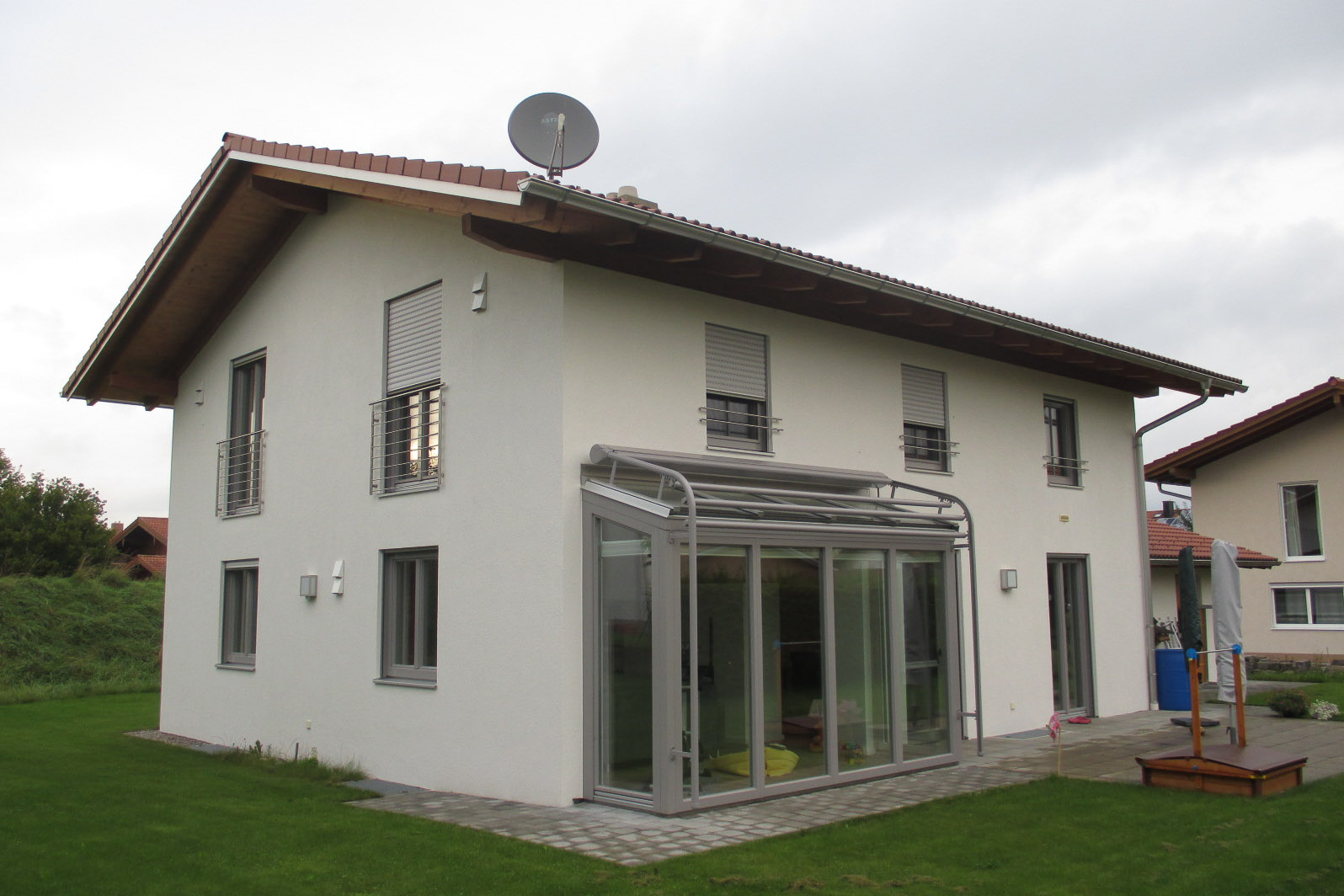 Einfamilienhaus - Wintergarten mit Beschattung